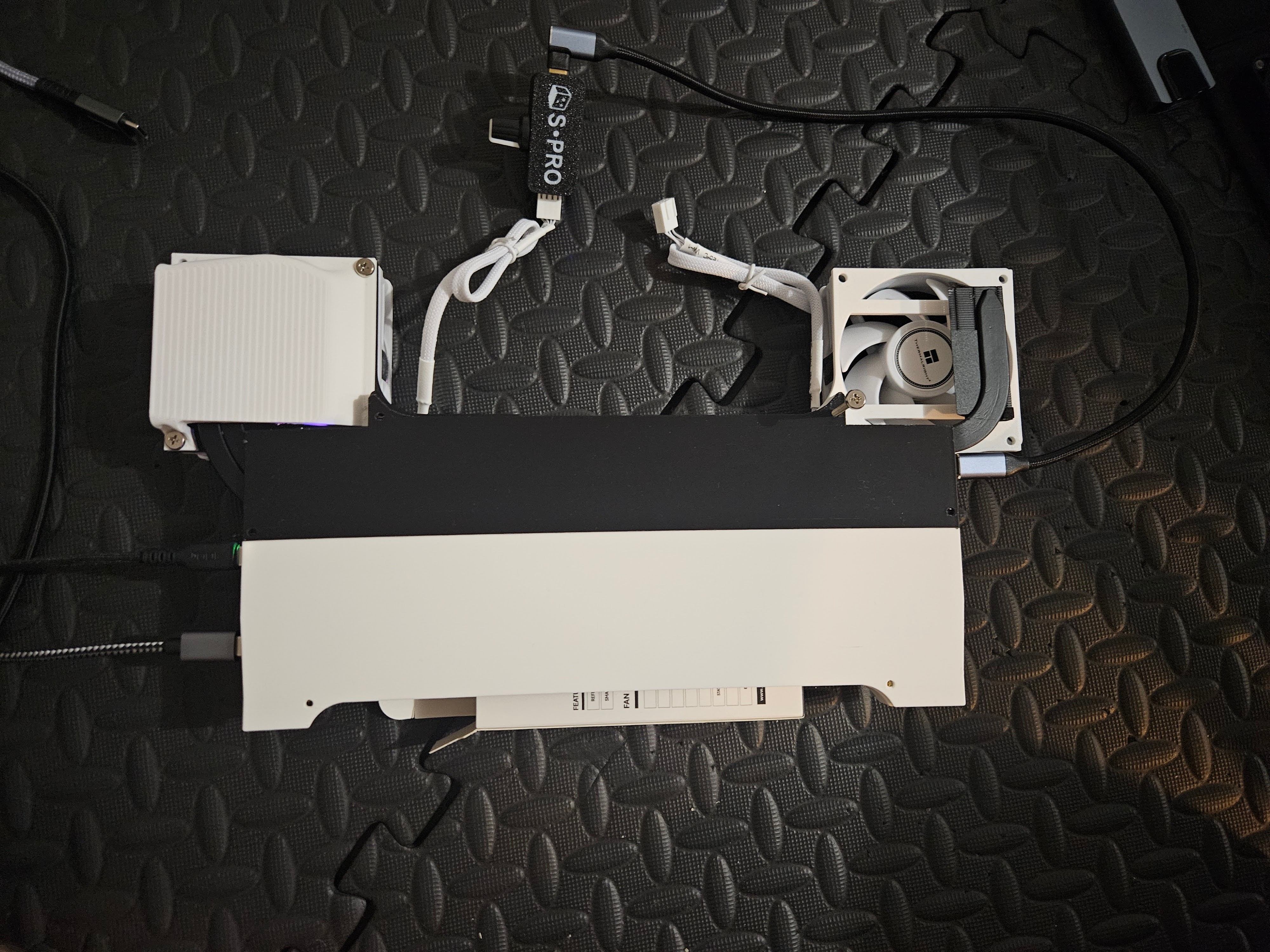 Framework 16 mainboard installed inside the 3D-printed backpack-inspired enclosure.